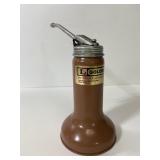 Small vintage golden rod oil can