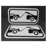 Two metal tow signs