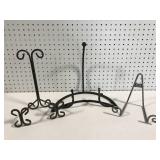 Three metal plate display stands
