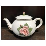 White ceramic teapot w/ applied relief flowers