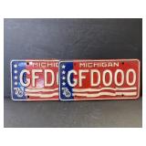 Set of 1976 Michigan license plates - red