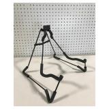 Portable folding guitar stand