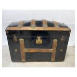 Antique humpback travel trunk