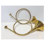 Pair of brass trumpet wall art