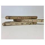 Three vintage folding yard sticks