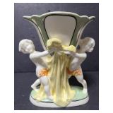 Lustre vase with cherub