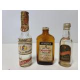 Three vintage mini cocktail bottles
