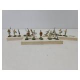 Tiny figures on wood