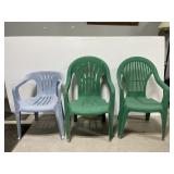 Lot of 3 plastic outdoor patio chairs