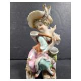 Vintage woman fishing figurine