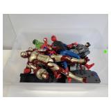 Collection of oversized superhero action figures