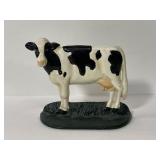 Vintage painted cast iron cow doorstop