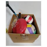 Box of balls and sports toys