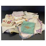 Large lot of colorful vintage embroidered linens