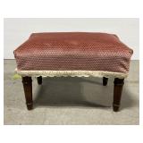 Small pink velvet upholstered wooden foot stool