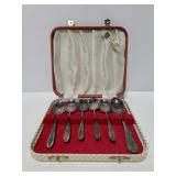 Six silverplate spoons