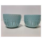 Two teal ceramic colanders