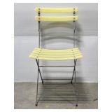 Vintage yellow metal folding café chair