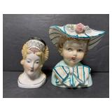Pair of vintage lady head vases