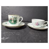 Pair of marked smaller teacups and saucers