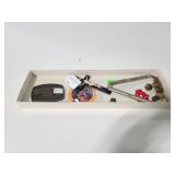 Crucifix, belt buckle, buttons and more