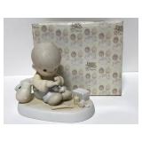 Precious Moments figurine with box