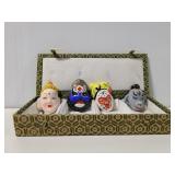 Set of 4 mini clay mask figures