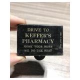 Old pharmacy advertising matchbook holder