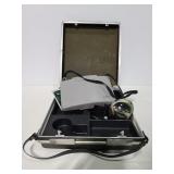 Vintage Polaroid camera with case