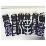 Lot of PathTravel luggage straps