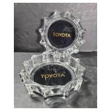 Pair of Toyota glass ashtrays