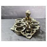 Small metal cherub vanity lipstick holder