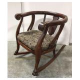 Antique carved wood rocking chair
