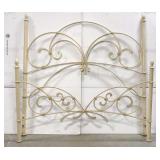 Ornate wrought iron bed frame.