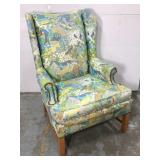 Retro upholstered wing back chair