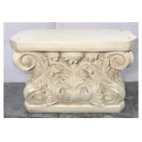 Ornate pedestal salvaged from a table