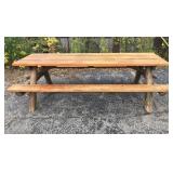 Large rustic wood picnic table