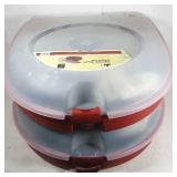 2 Christmas Wreaths in storage cases