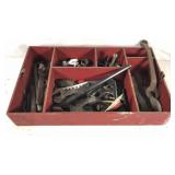 Red crate of Wrenches and parts