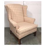 Pink plaid wing back chair