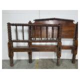 Vintage wood spindle bed