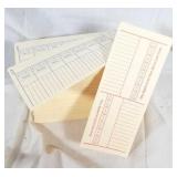 Stack of time clock cards