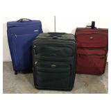 Lot of 3 large rolling suitcases