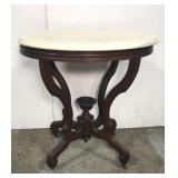 Antique oval marble top table