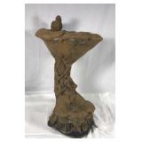 Small cement garden birdbath