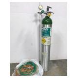 Medical oxygen tank with tubes