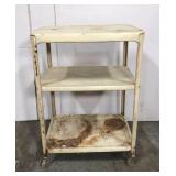 Old metal rolling cart