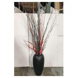 Black vase with painted stick decor