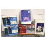 A lot of 5 outdoor lighted Christmas decor