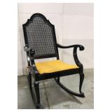 Vintage black cane rocking chair